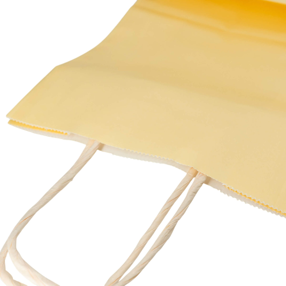 Sacos Asa Torcida Kraft Branco 90g - Amarelo Pastel